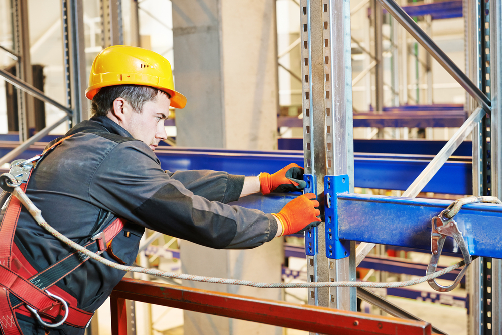 One,Warehouse,Worker,In,Uniform,During,Rack,Erection,Work,Installation