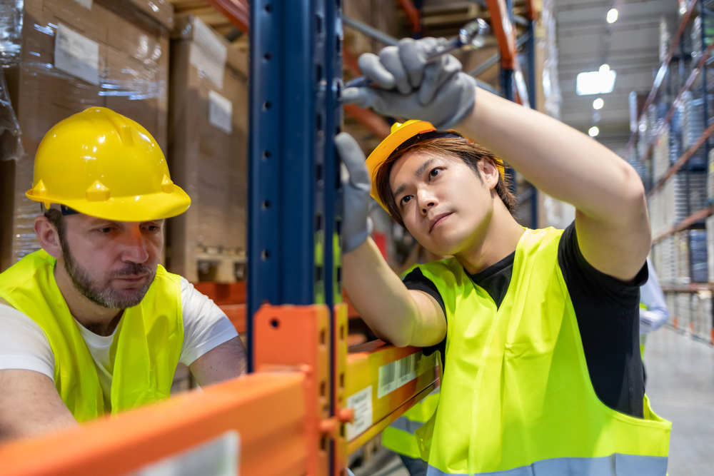 Worker,During,Rack,Arrangement,Erection,Work,In,Warehouse